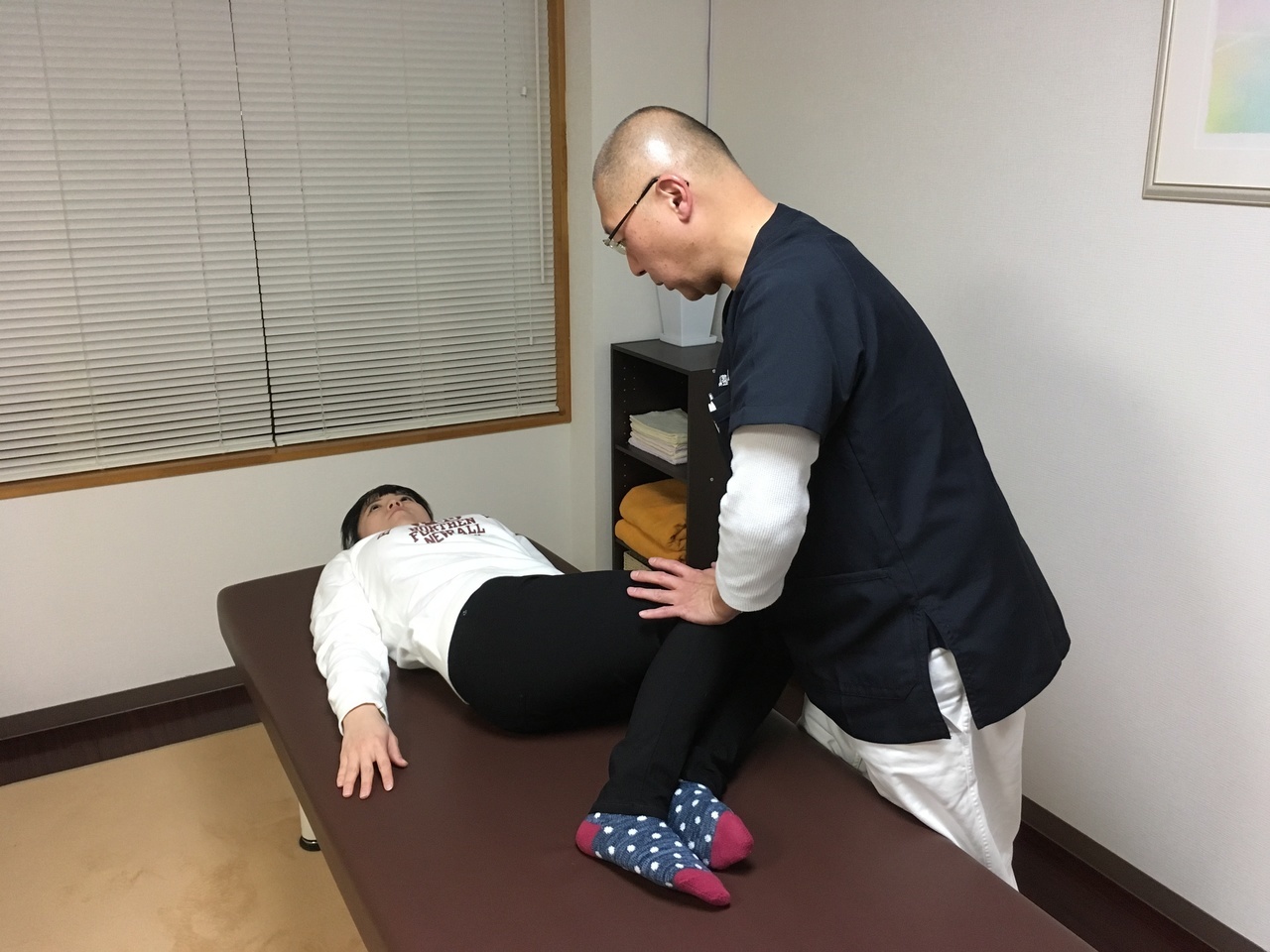 腰の可動域検査